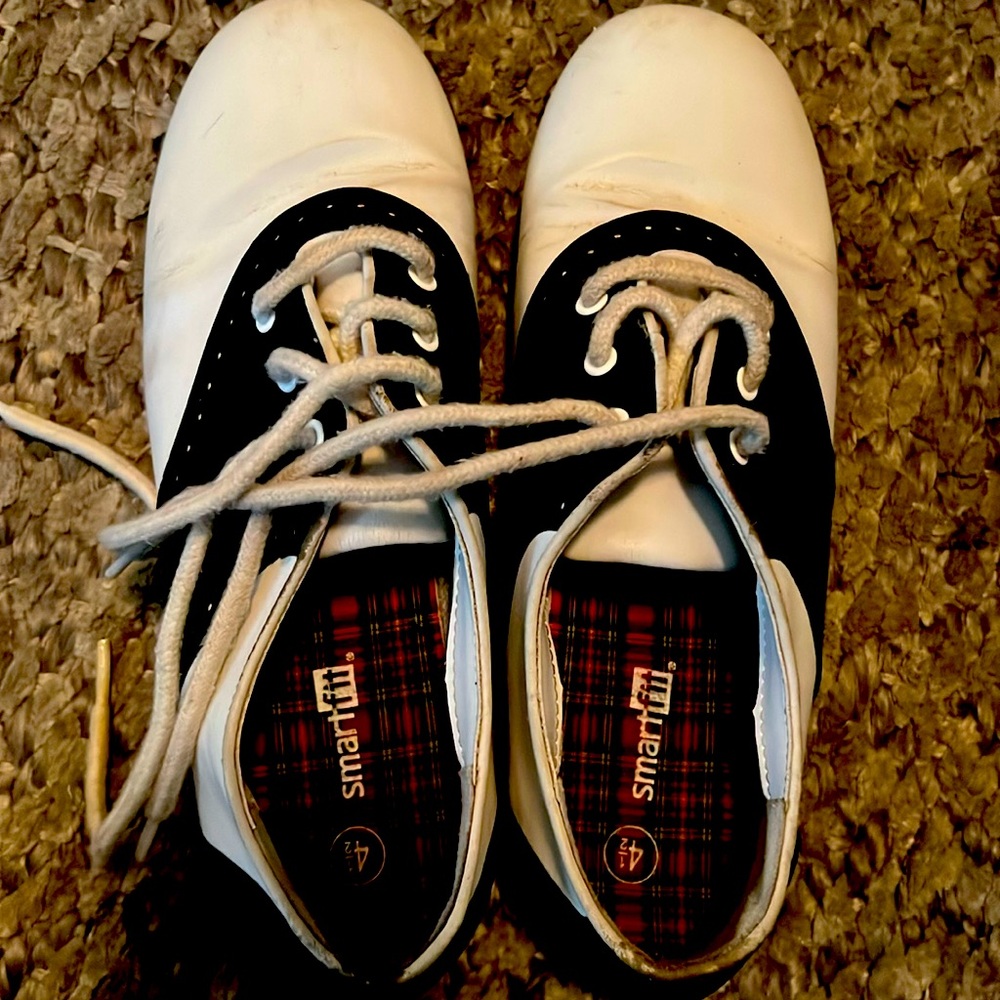 Girl black n white saddle shoes